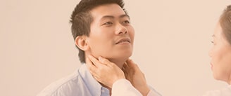 man with sore throat
