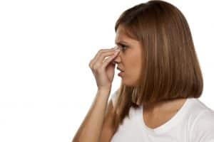 woman suffering from painful sinuses 
