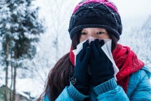 woman suffering from winter allergies
