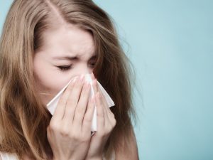 Woman suffering from allergies 