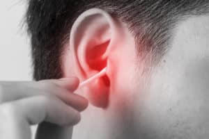 man hurt from ear picking
